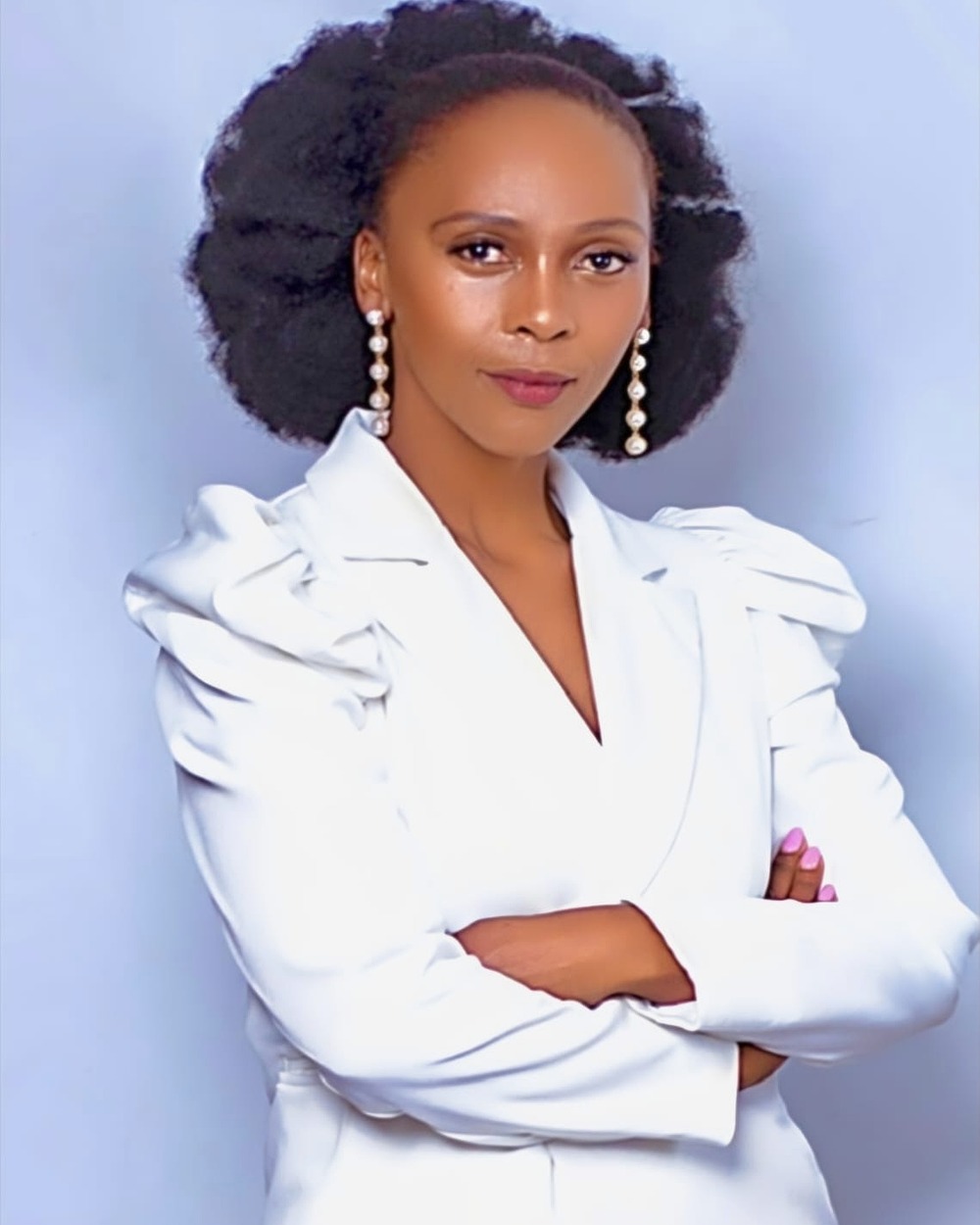 Portrait of Linda Shezi, Chief Executive Officer and Communications Officer.